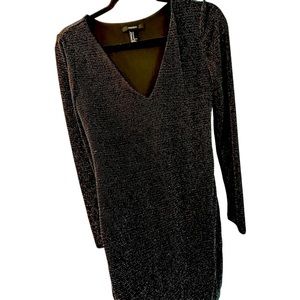 Forever 21 sparkly metallic long sleeve short dress. Size medium gently used.